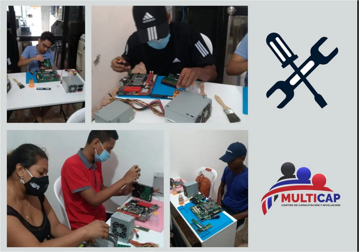 Estudiantes practicando reparación de computadoras e impresoras